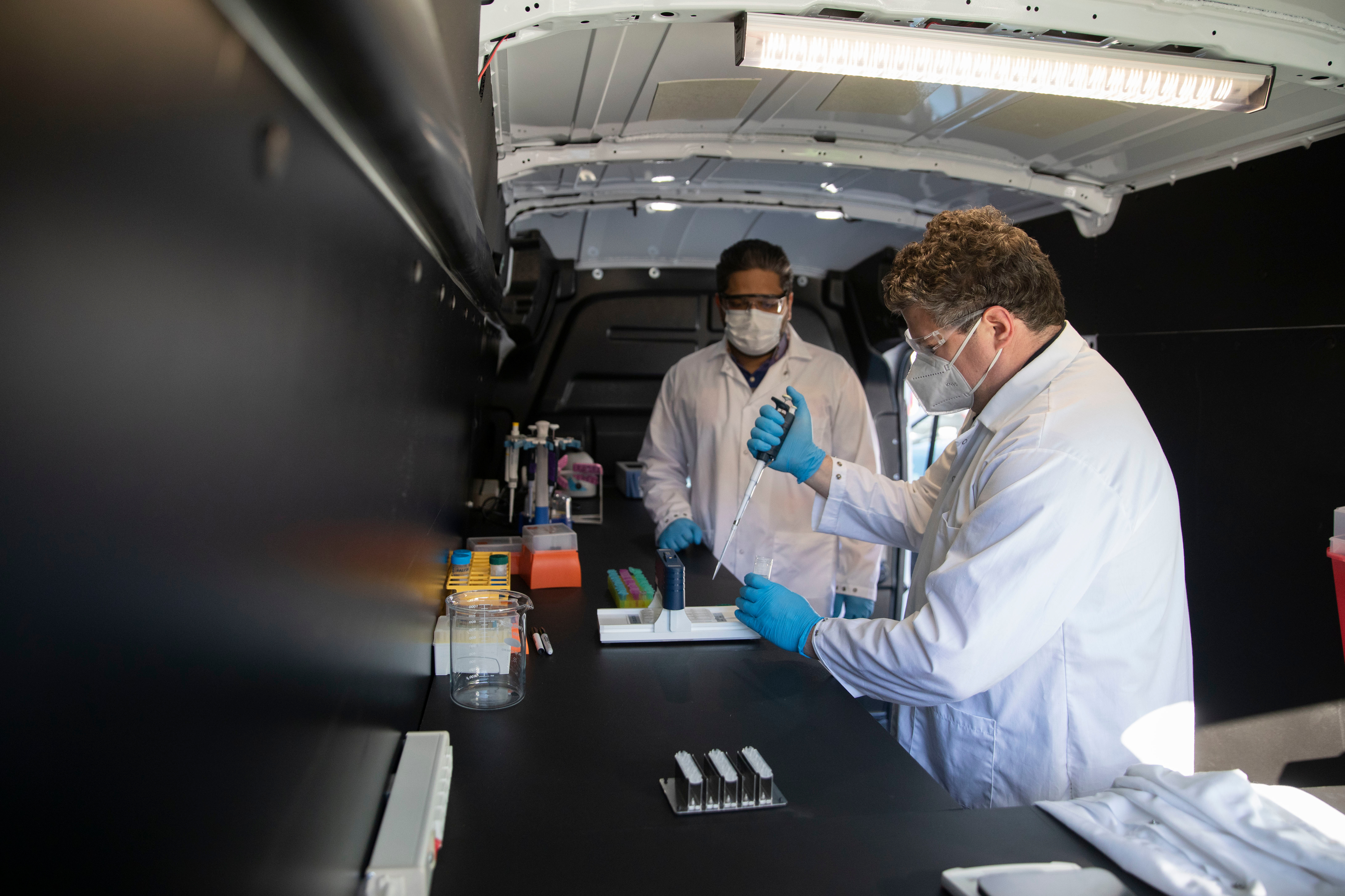 Scott Berry inside a mobile research unit.