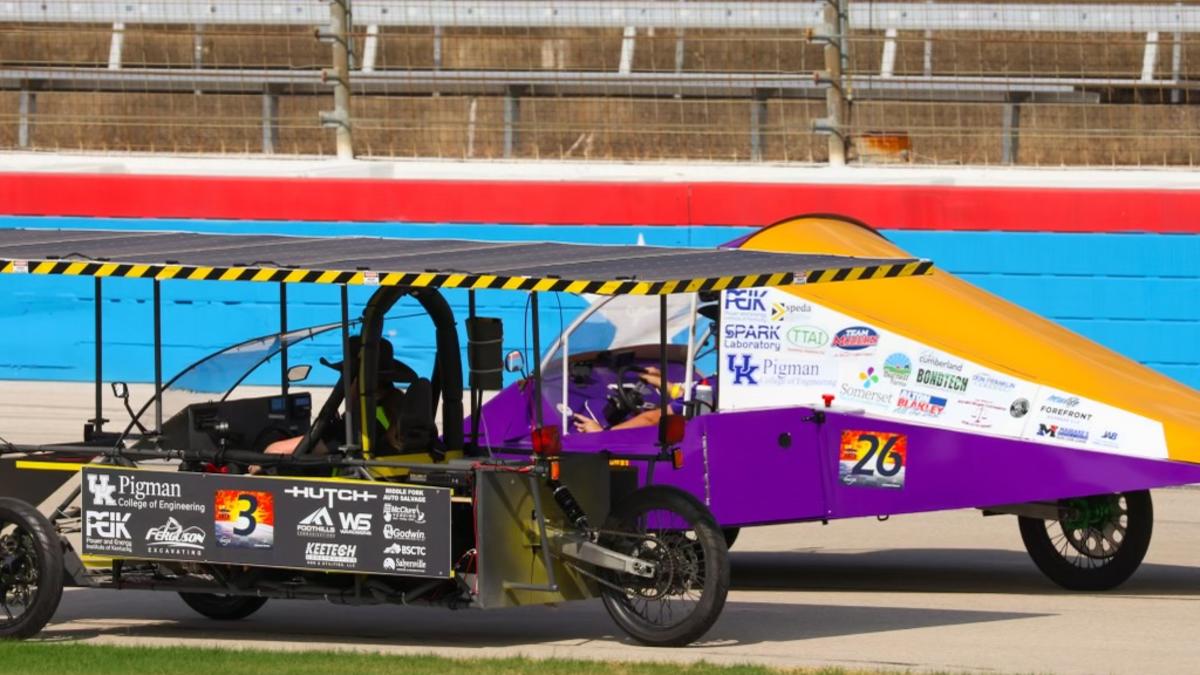 The Johnson Central EagleX car (left) and the Somerset Independent Solar Jumpers car (right)